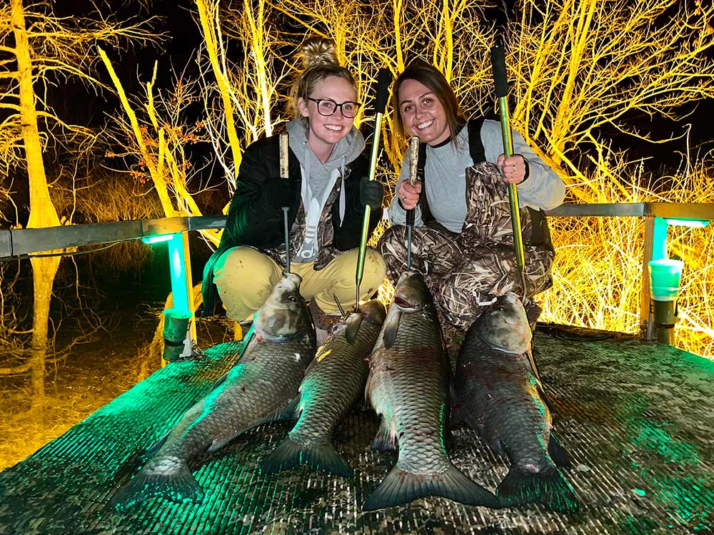 2 women and fish they caught